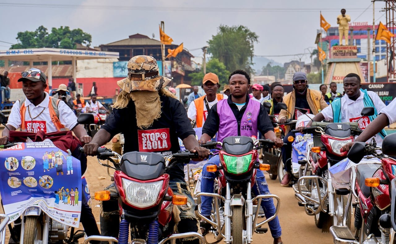 Motorcycle riders gather in the streets of Democratic Republic of Congo.